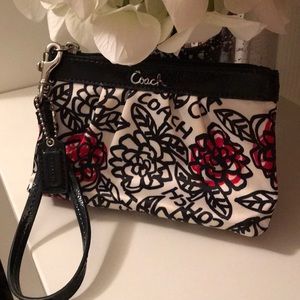 Coach mini wristlet in cute floral fabric!
